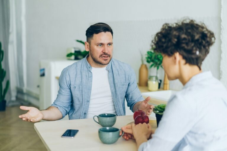 Conversation over coffee about daily struggles and encouragement for perseverance.